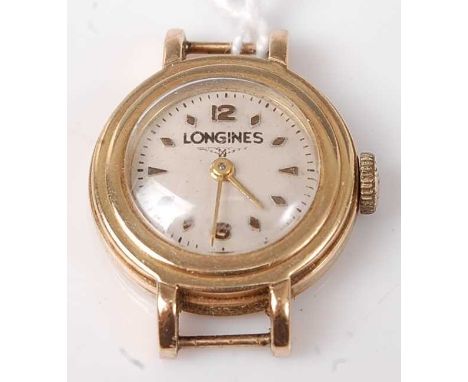 A lady's Longines 9ct gold wristwatch, having signed champagne dial, manual wind movement (lacks bracelet), case dia.20mm