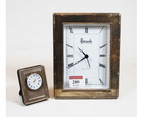 A modern silver clad mantel clock, of rectangular form, signed Harrod's Knightsbridge England, 17 x 13cm; together with a min