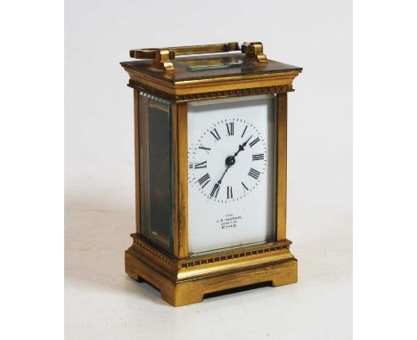 A 20th century lacquered brass cased carriage clock the enamel dial with Roman numerals signed JR Ingram, Crown Street, St Iv