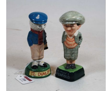 A pair of Royal Doulton limited edition Millennium Collectables Golfer &amp; Caddy figures, being the Penfold Golfer and the 