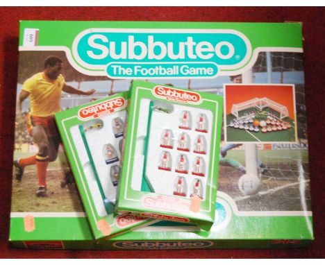 A boxed Subbuteo Club edition table football game, together with two boxed Subbuteo table soccer teams