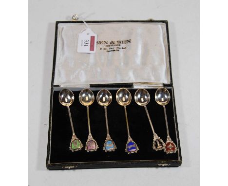A set of six sterling silver coffee spoons each terminal enamel decorated with an area of India in fitted leather case, case 