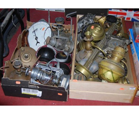 Two boxes of miscellaneous items to include various brass lamp parts,lawn bowls, salter scales, cobblers last etc