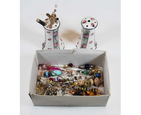 A collection of miscellaneous hat and stick pins; together with two hat-pin holders
