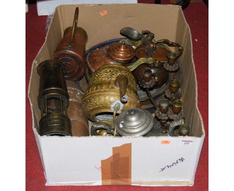 A box of miscellaneous metal ware to include continental copper jug relief decorated with a tavern scene, brass spirit kettle