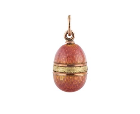 A FABERGE GOLD AND GUILLOCHE ENAMEL EGG PENDANT, WORKMASTER HENRIK WINGSTROM, ST. PETERSBURG, 1899-1904 the salmon pink guill