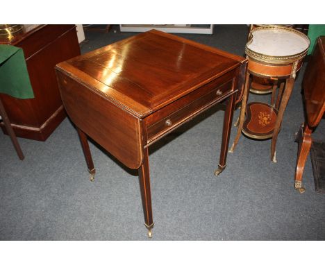 A George III inlaid mahogany games table with rectangular twin drop-flap top, sliding square panel to reveal backgammon table