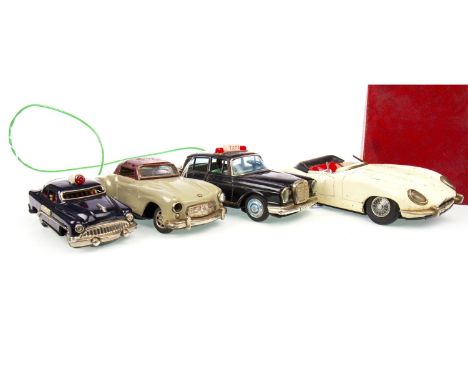 JAPANESE 1960S TOMIYAMA TIN PLATE MODEL JAGUAR E TYPE, battery operated, lacking box; along with a Japanese tin plate model o