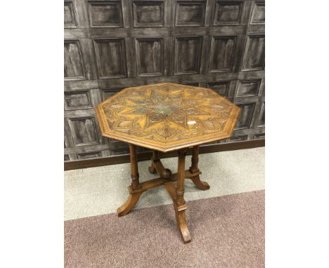 LATE VICTORIAN WALNUT OCTAGONAL CENTRE TABLE, the top intricately and attractively carved with geometric and floral motifs, o