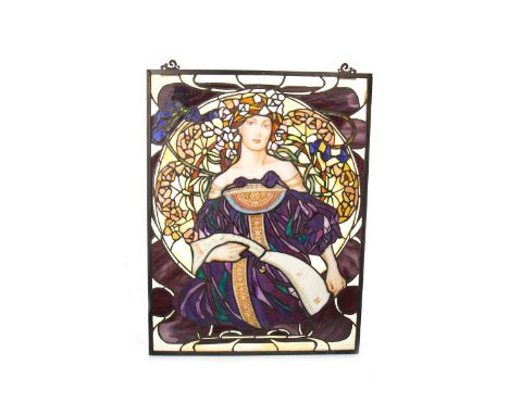 UPRIGHT STAINED GLASS PANEL, of Pre-Raphaelite design, depicting a maiden holding an illuminated book with an arch, 60cm x 45