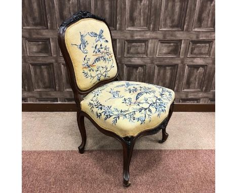 VICTORIAN ROSEWOOD PARLOUR CHAIR OF ROCOCO DESIGN, the shell and floral carved top rail with upholstered back and seat in tap