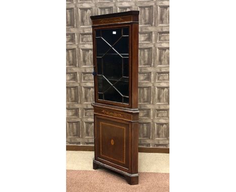 EDWARDIAN MAHOGANY SHERATON REVIVAL TWO STAGE CORNER CUPBOARD, the blind dentil cornice with inlaid frieze, shelving below en