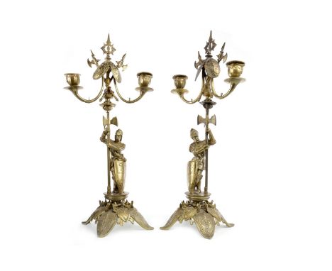 PAIR OF CAST BRASS CANDELABRA, each with two shield mounted scrolling branches, with single knight in armour support, on shie