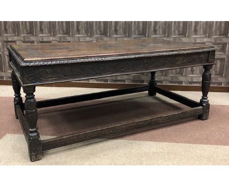 VICTORIAN CARVED OAK HALL TABLE OF 17TH CENTURY DESIGN, the table top carved with central roundel depicting portrait bust of 