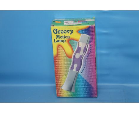 A BOXED GROOVY MOTION LAMP