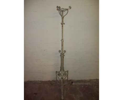 AN IRON FLOORSTANDING LAMP