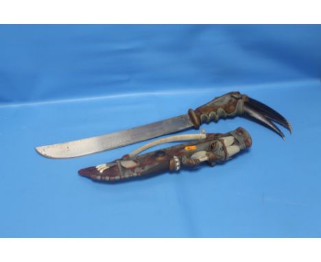 A TRAMONTINA MACHETE WITH TOUCAN HEAD DECORATION AND SCABBARD