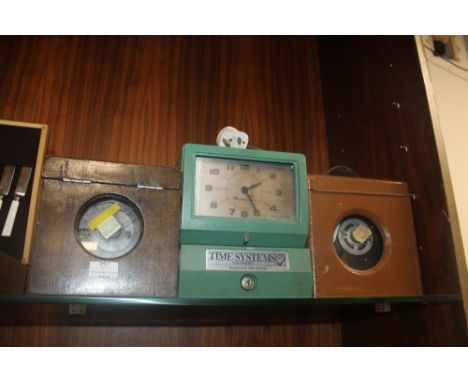 TWO PIGEON CLOCKS AND A CLOCKING IN CLOCK