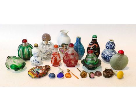 A collection of Chinese snuff bottles including peking glass, celadon jade and porcelain (one tray)