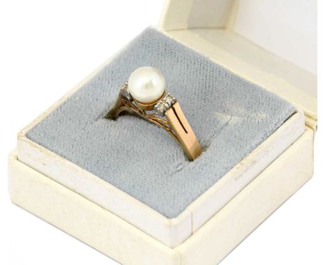 A cultured pearl and diamond ring, the cultured pearl flanked by pairs of eight-cut diamonds, in white claw settings, to a ye