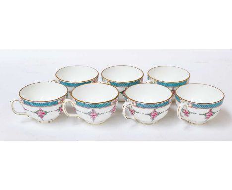 A Minton 'Blue Star Line' tea service comprising teapot and cover, seven cups and six saucers, and a bread and butter plateTh