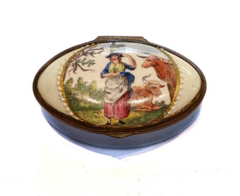 An 18th century South Staffordshire enamel patch box of oval form, pale blue ground and the cover printed and painted with a 