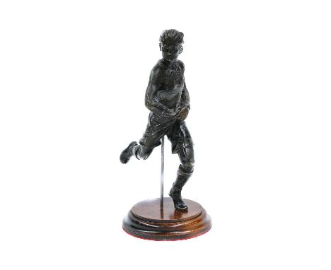 A bronze figure of England Rugby Union Captain Dicky Lockwood "The Little Tyke", running holding a rugby ball, later mounted 