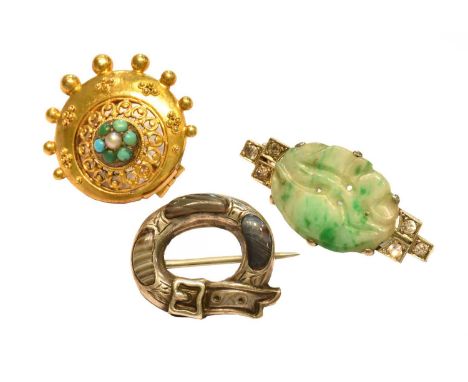 A jade and diamond brooch, stamped '18CT', length 3.0cm; a turquoise and split pearl brooch; and a hardstone broochJade - 3.7