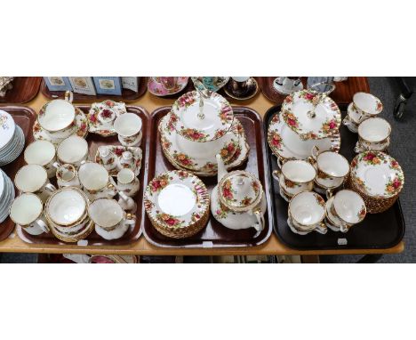A Royal Albert Old Country Roses comprehensive tea service including, teapot, twelve trios, two cake stands, three sandwhich 