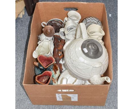A quantity of Victorian and later ceramics, a 19th century mug, two Dartmouth fish "glug" jugs, a large teapot with pewter li
