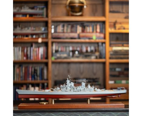 This lot features a meticulously crafted scale model of the USS Missouri, one of the most famous battleships in United States