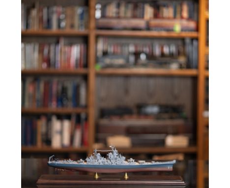 This finely crafted scale model represents the iconic USS Missouri (BB-63), famously known as Mighty Mo. The USS Missouri, a 