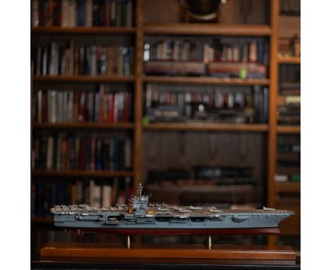 This expertly crafted scale model represents the USS Enterprise (CVN-65), the world's first nuclear-powered aircraft carrier 