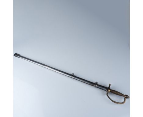 An antique Indian military sword featuring a brass hilt with an intricately textured grip and a traditional knuckle guard. Th