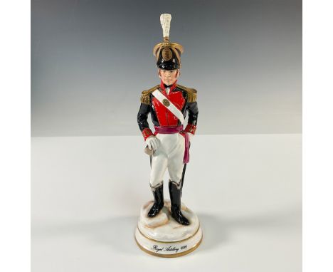 A limited edition Michael Sutty porcelain military figurine. This meticulously hand painted figure showcases a striking red a