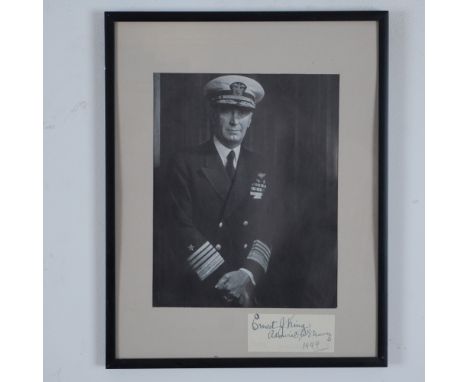 This autographed black and white photograph features Fleet Admiral Ernest J. King, one of the most significant naval officers