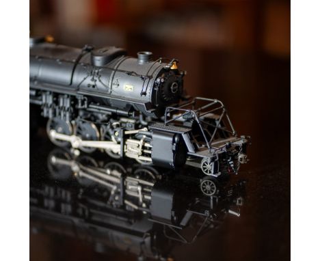 Offered here is a Lionel Santa Fe 2-8-8-2 Locomotive and Tender, model number 6-38030, featuring road number 1795. This finel