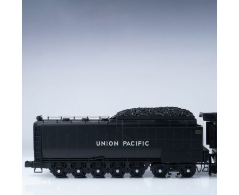 This is a meticulously crafted HO Scale model of the Union Pacific Big Boy #4014, one of the most iconic locomotives in Ameri