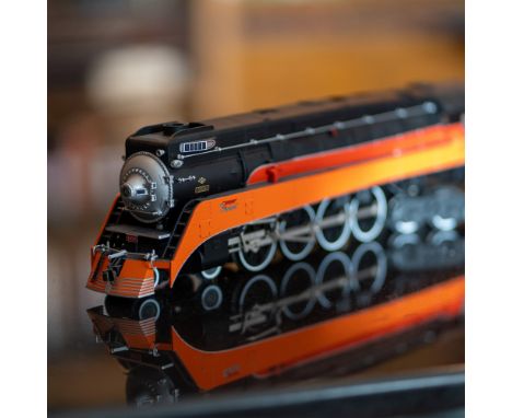 This auction features a Lionel model of the Southern Pacific GS-2 Daylight 4-8-4 steam locomotive and tender, road number 441