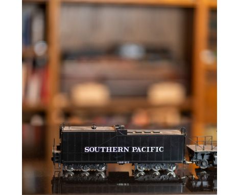 A finely crafted O scale model of the iconic Southern Pacific Cab Forward AC-12 locomotive, produced by Sunset Models Inc. Th