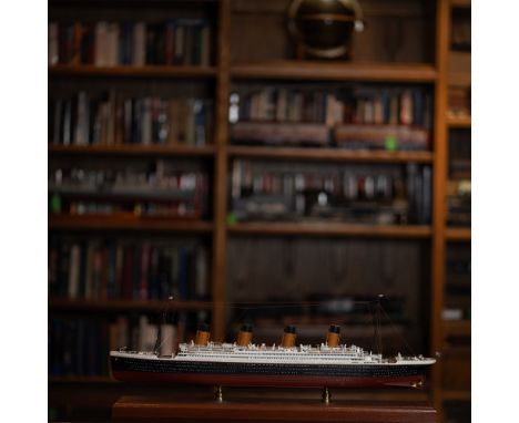 This is a meticulously crafted scale model of the RMS Titanic, one of the most iconic and tragic vessels in maritime history.