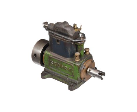 A model of a Stuart Turner 'Serius' marine engine, having enclosed cylinders with blued steel lagging, fitted brass displacem