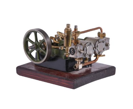 A well-engineered model of a Stuart Turner 'Score' horizontal live steam engine, having twin cylinders 3/4 inch stroke by 3/4