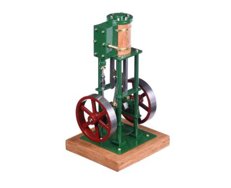 A model of a vertical live steam stationary engine, built by Mr D Russell of Fraserburgh. The single cylinder with ¾ inch bor