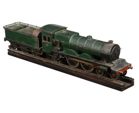 A model of a 3 1/2 inch gauge live steam 4-4-2 tender locomotive, the copper boiler having back-head fittings including steam