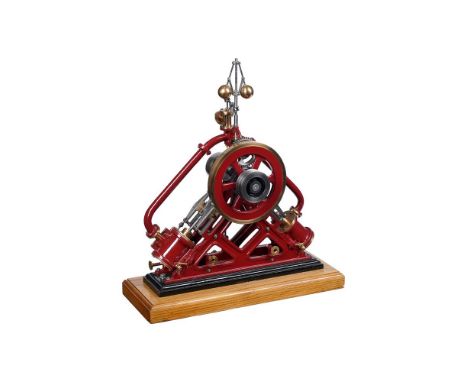 An exhibition standard model of a diagonal motion stationary engine, built by Mr G Emery of Worcestershire. The cylinders and