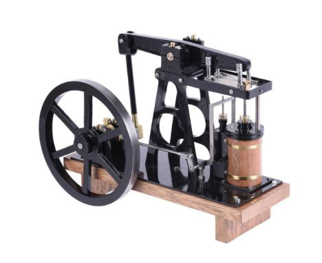 A freelance model of a live steam beam engine, built by Mr D Russell of Fraserburgh. The beam supported on 'A' frame support 
