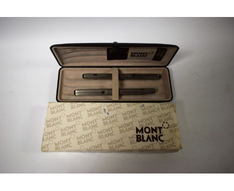 A Mont Blanc Turbo fountain pen and stylus pen, engine turned stainless steel barrels and tops, cased en suite with internati