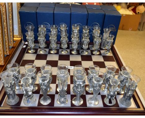 A Lord of The Rings novelty pewter chess set, by Royal Selangor, each piece as a shot glass, sculpted by Dr Graeme J Anthony,