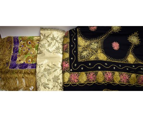 Textiles - a felt wool throw, metallic thread embroidered, fringe edge; a cream silk panel, silver thread embroidered; an emb